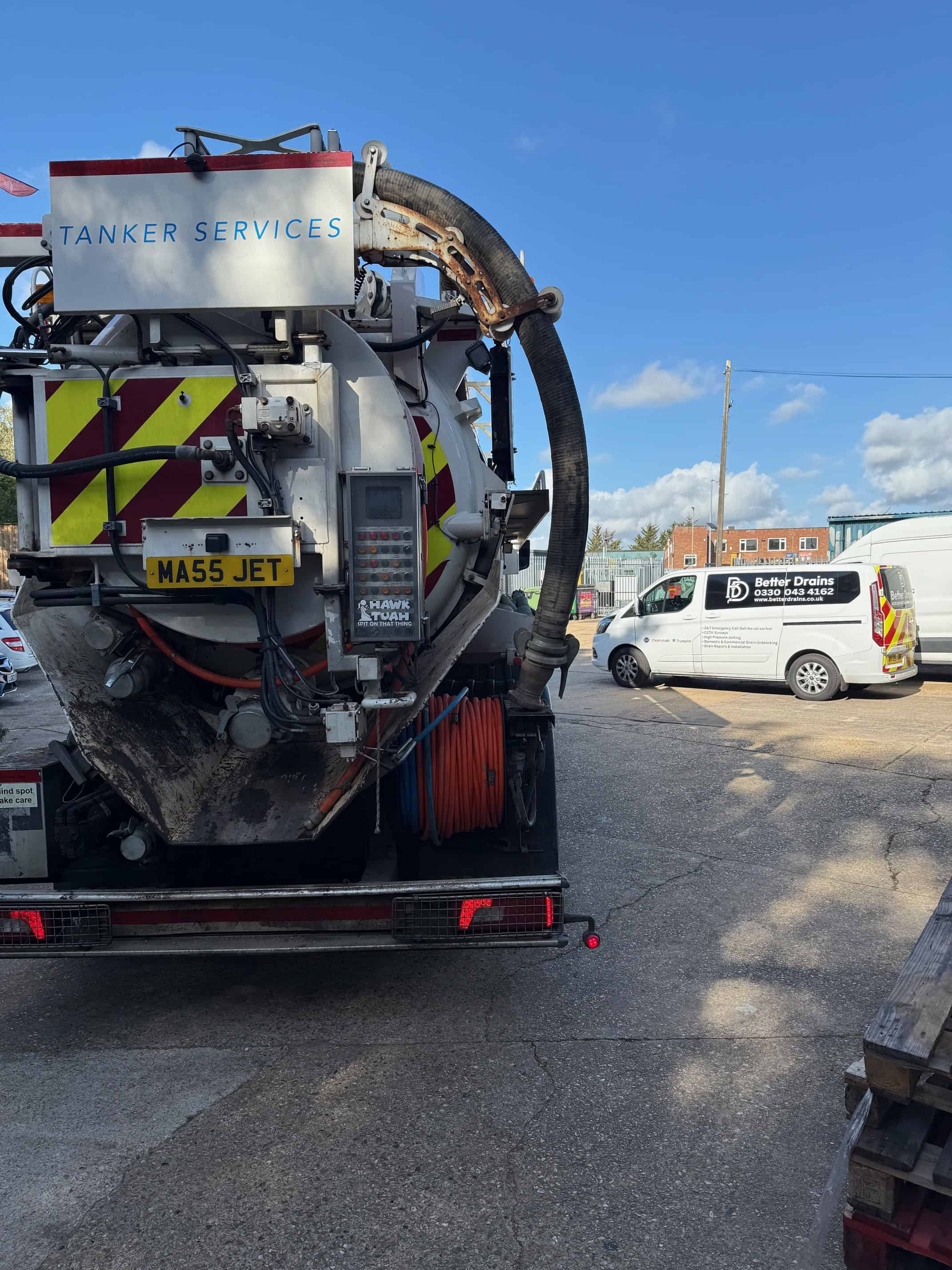 Emergency drainage service vehicle for urgent drain repairs and cleaning.